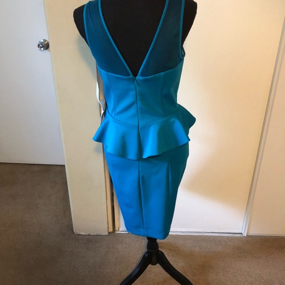 🔥SALE PRICE!! NEW Sexy🔥Peplum Dress - Picture 4 of 4